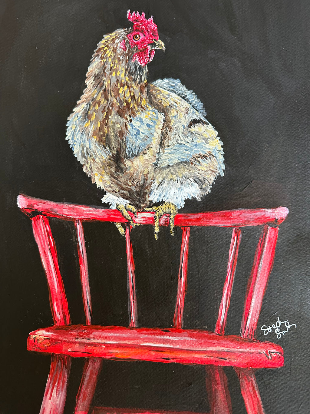 Rooster on a chair